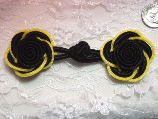 0250  Black & Yellow Frog Button Closure 3.75"