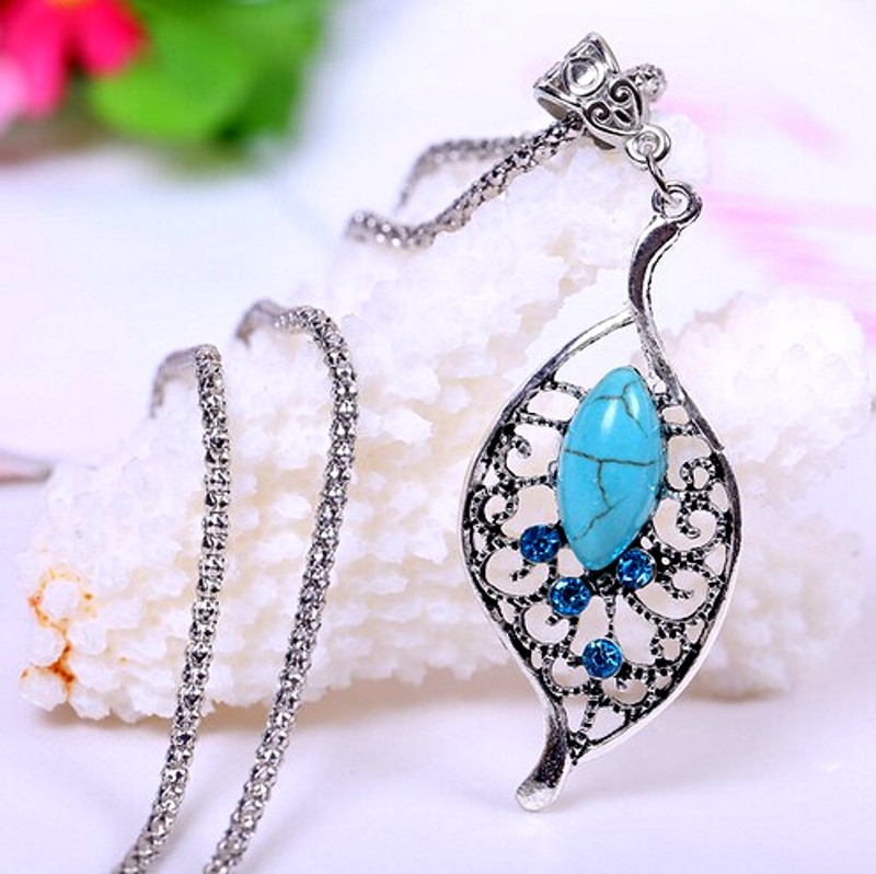 Silver leaf necklace with a turquoise dangle